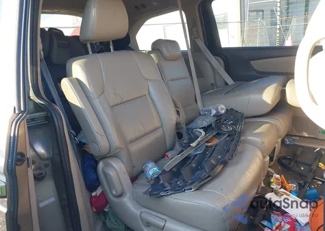 2011 Honda Odyssey Ex-L z USA, uszkodzony, nr VIN 5FNRL5H6XBB041387